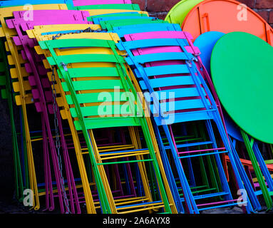 varicolored collapsible plastic furniture, chairs and tables Stock Photo