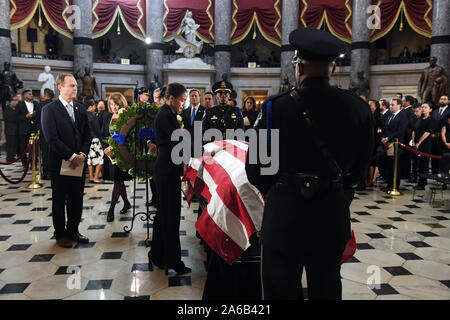 Washington DC, USA. 24th Oct, 2019. United States Representative Adam Schiff (Democrat of California) waits in line as US Representative Alexandria Ocasio-Cortez (Democrat of New York) pays her respects to United States Representative Elijah Cummings (Democrat of Maryland) in National Statuary Hall at the United States Capitol on Thursday October 24, 2019 in Washington, DC. The service preceded Cummings lying in state in front of the US House chamber. Credit: Matt McClain/Pool via CNP Credit: Matt Mcclain/CNP/ZUMA Wire/Alamy Live News Stock Photo