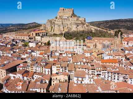 Picturesque aerial view of walled city Morella with medieval Castle on rocky hilltop, Castellon, Spain Stock Photo