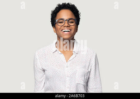 Head shot portrait laughing African American woman in glasses Stock Photo