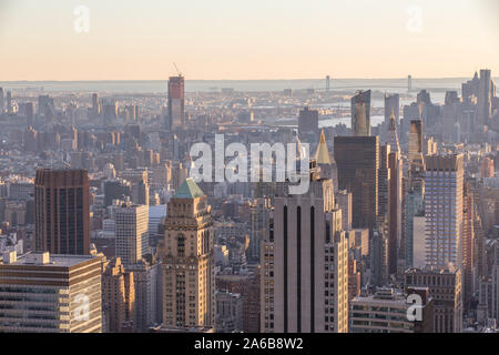 Sunset view of Manhattan City Skyline and the Empire State Building from Top of the Rock on Rockefeller Center Stock Photo