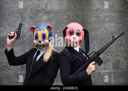 London UK. 25 October 2019. Women dressed as L to R Cha Cha and