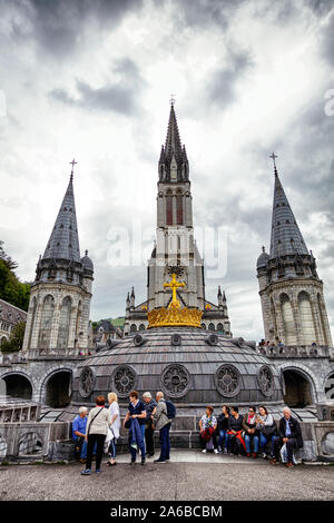 LOURDES - JUNE - 15 - 2019: Christian cross on a background the ...