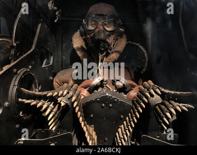 Yorkshire air museum display of rear gunners position in a large British four engine heavy bomber. Man is a dummy. Stock Photo