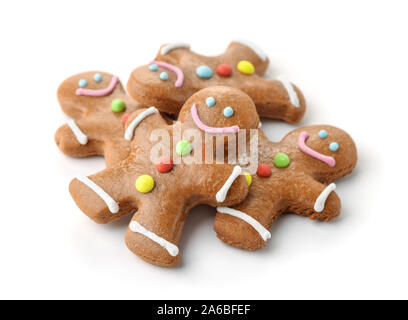 Pile of gingerbread men isolated on white Stock Photo