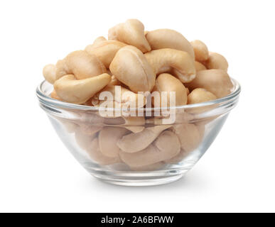 Glass bowl of cashew nuts isolated on white Stock Photo