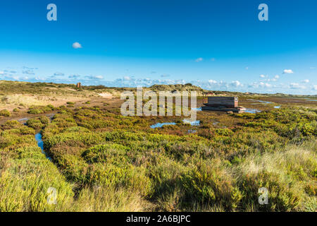 A houseboat on the Salt Marshes near Burnham Overy Staithe near Holkham Bay on North Norfolk Coast, East Anglia, England, UK. Stock Photo