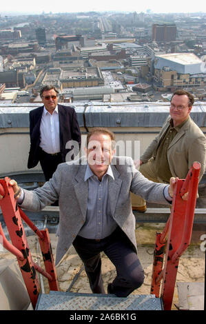 Admiral Insurances Chief Executive Henry Engelhardt, centre, pictured with  Andrew Probert, Finance Director, left, and David Stevens, Pricing and  Underwriting Director, right, on the roof of their HQ in Cardiff Tower.  27/3/03