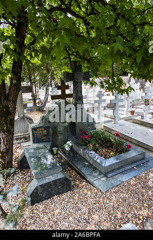 A grave tomb of the famous Russian film director, Andrei Tarkovsky, at the Sainte-Genevieve-des-Bois Russian Cemetery, France Stock Photo