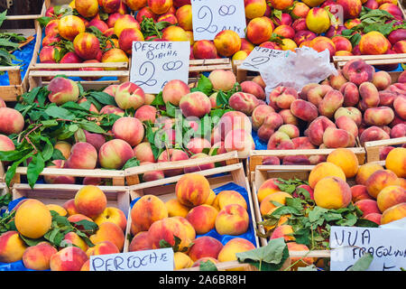 Peaches and nectarines for sale at a market Stock Photo