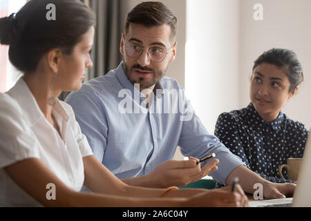 Young smart multiracial business people working in office Stock Photo