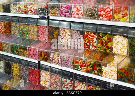 Boxes of pick and mix sweets, including dolly mixtures, jelly beans, fizzy cola bottles and fizzy dummies Stock Photo