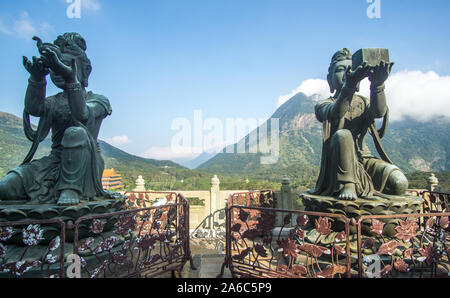 Gods statues that captured on a  Beautiful day at the Big Buddha in Lantau Island , Hong Kong .  Its an amazing short escape from the crowded city wi Stock Photo