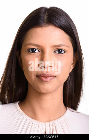 Face of young beautiful Brazilian woman shot in studio Stock Photo
