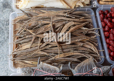 Dried sea horse selling for medical purposes in chinese pharmacy. Traditional in east asia believe that sea horse for medicine affects the lung and ki Stock Photo