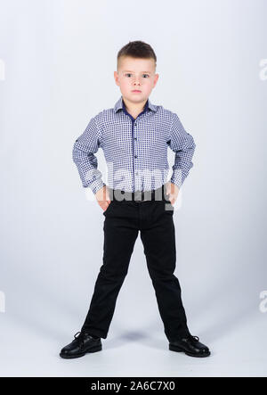 Little boy wear formal clothes. Cute boy serious event outfit. Impeccable style. Happy childhood. Kids fashion. Small businessman. Business school. Confident boy. Upbringing and development Stock Phot...