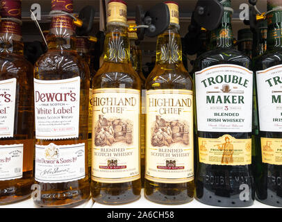 Moscow, Russia - September 23, 2019: scotch and irish whisky stands on supermarket shelf Stock Photo