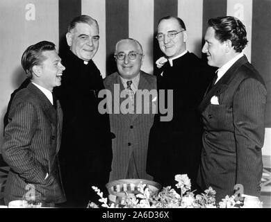 MICKEY ROONEY BISHOP JAMES HUGH RYAN LOUIS B. MAYER FATHER EDWARD J. FLANAGAN and SPENCER TRACY Tribute at MGM Studios to Father Flanagan publicity for MEN OF BOYS TOWN 1941 director Norman Taurog Metro Goldwyn Mayer Stock Photo