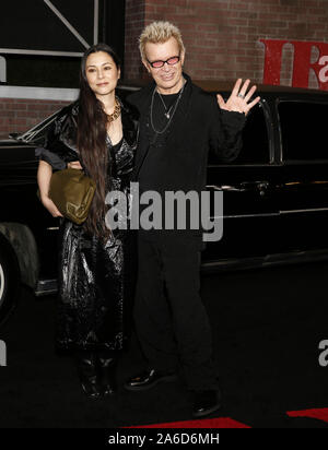 Los Angeles, CA - October 24, 2019: Billy Idol and China Chow arrive for the Premiere Of Netflix's 'The Irishman' held at TCL Chinese Theatre Stock Photo