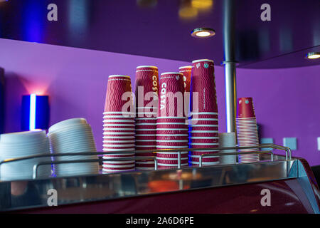 Stacked up Costa Coffee branded take away not recyclable cups Stock Photo