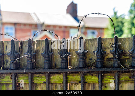 iron fence fence to typical british backyard in england. Stock Photo