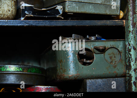 Old rusty tools on the garage rack claoseup Stock Photo