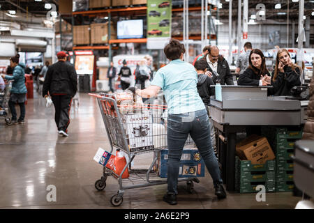 Tigard, Oregon - Oct 25, 2019 : Checkout lanes in a Costco Wholesale store Stock Photo