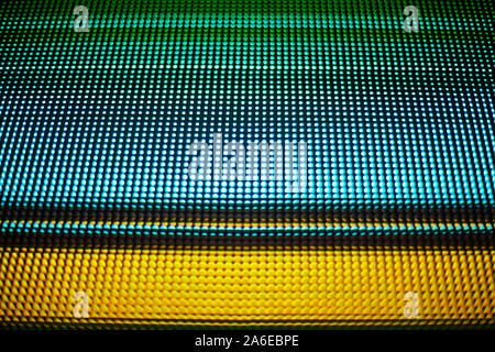 Abstract colorful parallel lines texture background, blue, green, yellow neon light strips on black backdrop, decorative bright dots ornament, pattern Stock Photo