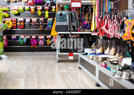 Interior of pet store with large assortment of pet accessories, toys, outfits and equipments Stock Photo