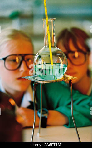 Children. Two girls in school classroom science lesson. Stock Photo