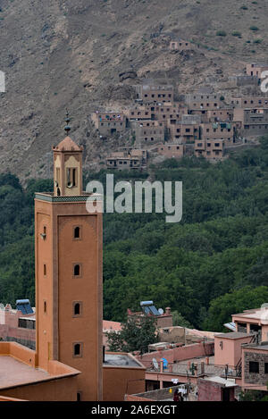 Minaret of the village mosque and hillside houses, Imlil, High Atlas, Morocco, North Africa. Stock Photo