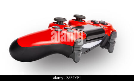 Red PS3 Controller on a plain white background with no people, Stock Photo