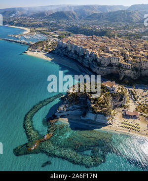 Aerial view of Tropea, house on the rock and Sanctuary of Santa Maria dell'Isola, Calabria. Italy. Tourist destinations. A cliff and a beach