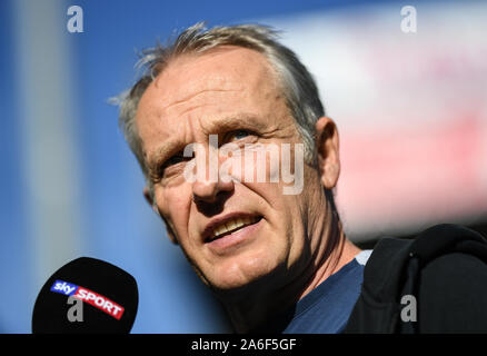 26 October 2019, Baden-Wuerttemberg, Freiburg: Soccer: Bundesliga, SC Freiburg - RB Leipzig, 9th matchday in the Schwarzwaldstadion. Coach Christian Streich from Freiburg gives an interview. Photo: Patrick Seeger/dpa - IMPORTANT NOTE: In accordance with the requirements of the DFL Deutsche Fußball Liga or the DFB Deutscher Fußball-Bund, it is prohibited to use or have used photographs taken in the stadium and/or the match in the form of sequence images and/or video-like photo sequences. Stock Photo