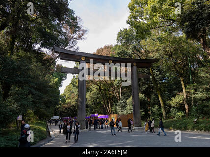 Tokyo, Japan - October 31st, 2018: Tourists on the entrance path to the Meiji temple in Tokyo, Japan Stock Photo