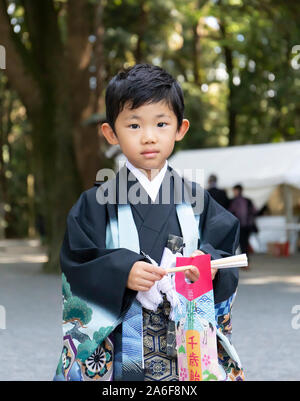 Tokyo, Japan - October 31st, 2018: A japanese boy in a traditional outfit near the Meiji temple in Tokyo, Japan Stock Photo