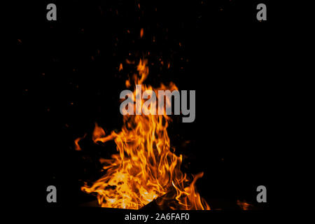Burning with flames Orange and red fire isolated on black background Stock Photo