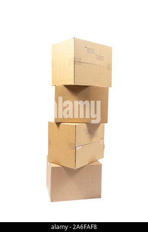 Vertical shot of Stack of Four Blank Cardboard Shipping Boxes Isolated on White. Stock Photo