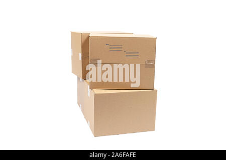 Horizontal shot of Three Blank Cardboard Boxes Isolated on White. Stock Photo