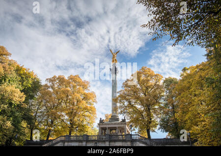 Friedensengel, Prinzregentenplatz, Munich, Bavaria, Germany, a park statue of a golden angel on a column, and monument to peace. Stock Photo