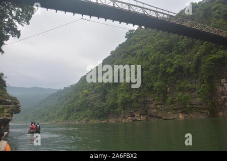 The hanging suspension  bridge of  Umngot river in Dawki, Shillong, Meghalay near India-Bangladesh border as seen from below the river Stock Photo