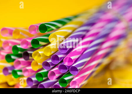 abstract colorful background, backdrop with colorful drinking striped straws Stock Photo