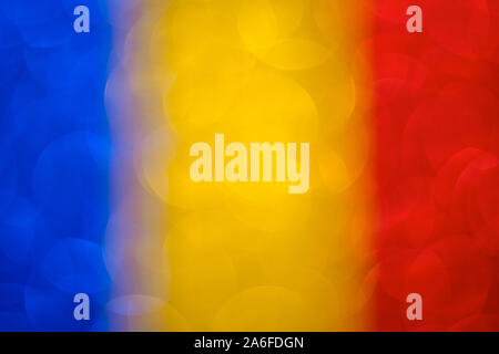 abstract patriotic background with bokeh, defocused glitter effect with blue yellow and red colors, shiny colorful template Stock Photo