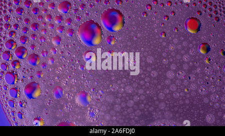 purple abstract background with bubbles, colorful water drops and foam texture backdrop Stock Photo