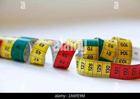 a tape measure in different colors that you use when sewing clothes Stock Photo