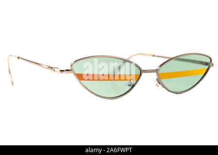 Green oval cat eye wrap around metal frame sunglasses with stripes isolated on white - side view Stock Photo