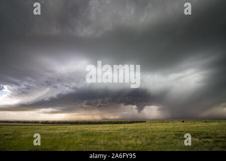 A supercell thunderstorm approaches on the plains of eastern Colorado during the afternoon. Stock Photo