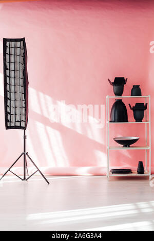 Photo studio equipment accessories photographer flashes on pink background Stock Photo