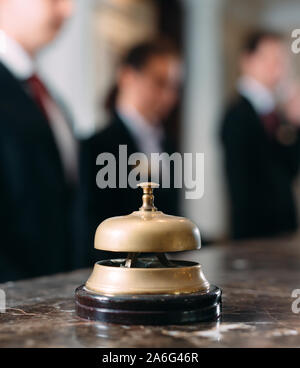 Hotel service bell Concept hotel, travel, room,Modern luxury hotel reception counter desk on background Stock Photo
