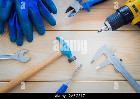 Workshop tools on a wooden board Stock Photo